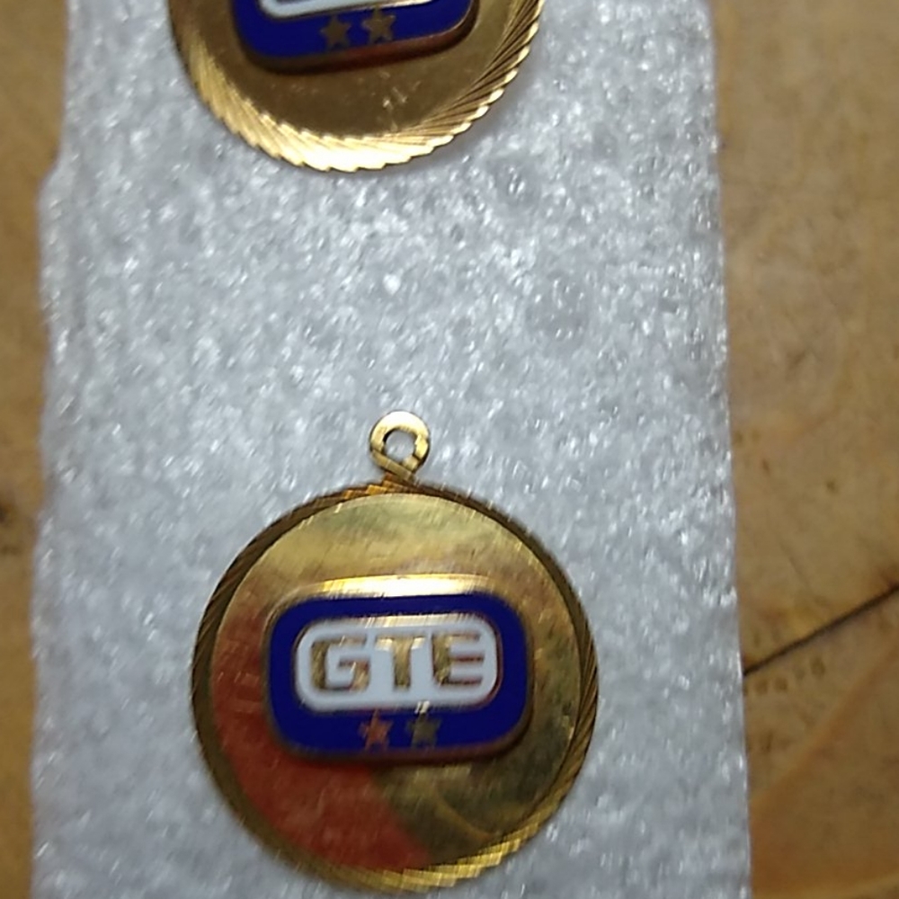 Vintage emblem charm